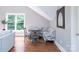 Cozy breakfast nook with a corner banquette seating and lots of natural light at 552 Wyndham Ln, Marvin, NC 28173
