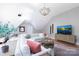 Relaxing living room with comfortable seating and a large television for entertainment at 552 Wyndham Ln, Marvin, NC 28173