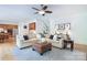 Open-concept living area with hardwood floors, and a large comfortable seating area at 552 Wyndham Ln, Marvin, NC 28173