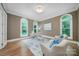 Cozy office with large windows, hardwood floors, and a neutral color palette at 552 Wyndham Ln, Marvin, NC 28173