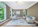 Comfortable office with hardwood floors, arched windows, and natural light at 552 Wyndham Ln, Marvin, NC 28173