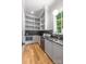 Well-lit kitchen with stainless steel appliances and modern sink at 5601 Robinhood Rd, Charlotte, NC 28211