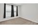 Neutral bedroom with carpet and large windows with dark curtains at 5946 Ardrey Kell Rd, Charlotte, NC 28277
