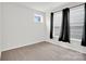 Neutral bedroom featuring a window and dark curtains that provide a relaxing atmosphere at 5946 Ardrey Kell Rd, Charlotte, NC 28277