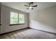 Cozy bedroom featuring a ceiling fan and double windows for ample light at 600 S Cline Ave, Newton, NC 28658