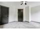 Bright bedroom with neutral carpet, modern fan, and trim; ready for personalized décor at 600 S Cline Ave, Newton, NC 28658