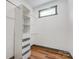Spacious closet with built-in shelves and hanging rods for organized storage at 600 S Cline Ave, Newton, NC 28658