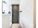 Modern tiled shower with matte black fixtures and door at 600 S Cline Ave, Newton, NC 28658