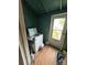Laundry room with a washing machine and a door leading outside at 618 Douglas St, Shelby, NC 28150