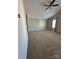 Large bedroom featuring a vaulted ceiling, barn door, and neutral carpet at 664 Cape Fear St, Fort Mill, SC 29715