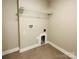 Laundry room with tile flooring, washer and dryer hookups, and shelving at 664 Cape Fear St, Fort Mill, SC 29715