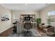 Bright home office with modern desk, shelving, and comfortable seating at 687 Cape Fear St, Fort Mill, SC 29715