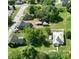 An aerial view displaying a house with the layout of the surrounding neighborhood at 711 Wood St, Albemarle, NC 28001