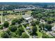 Aerial view of the neighborhood featuring tree-lined streets at 711 Wood St, Albemarle, NC 28001