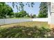 Spacious backyard with a white fence, offering privacy and outdoor space at 711 Wood St, Albemarle, NC 28001