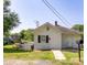 This home has a white exterior with dark shutters and a mailbox at 711 Wood St, Albemarle, NC 28001