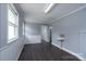 A flex room with wood look flooring and a utility sink at 711 Wood St, Albemarle, NC 28001