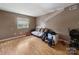 Comfortable bedroom with large window for plenty of natural light at 7977 Shady Oak Trl, Charlotte, NC 28210
