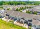 Aerial view of townhomes with fenced patios and mature landscaping at 809 River Park Rd, Belmont, NC 28012
