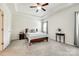 Inviting bedroom features a tray ceiling, plush carpet, and a cozy bed with stylish bedding at 809 River Park Rd, Belmont, NC 28012