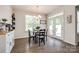 Cozy dining area with natural light and access to the outdoor patio at 809 River Park Rd, Belmont, NC 28012