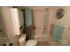 Clean bathroom with shower-tub combo, toilet, vanity, and storage with coordinated towels and curtain at 1062 Piney Church Rd, Concord, NC 28025
