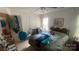 Bedroom featuring a traditional bed frame, blinds on the window, and a ceiling fan for added comfort at 1062 Piney Church Rd, Concord, NC 28025