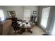 Cozy dining area with a round wooden table at 1062 Piney Church Rd, Concord, NC 28025