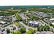 Stunning aerial view of 110 Dime Lane showcasing its prime location near lush greenery and other businesses at 110 Dime Ln, Mooresville, NC 28117
