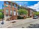 Charming brick townhome with mature landscaping and a welcoming entrance at 110 Dime Ln, Mooresville, NC 28117