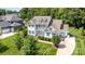 Expansive two-story home with a double porch, black shutters and an attached garage at 112 S Shore Dr, Belmont, NC 28012