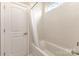 Bathroom features a white tiled shower/tub combo with white walls at 112 S Shore Dr, Belmont, NC 28012