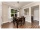 Cozy dining room with modern lighting, hardwood floors, and natural light at 112 S Shore Dr, Belmont, NC 28012