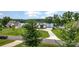 A lakeside community with manicured lawns and long concrete driveways leading to the homes at 112 S Shore Dr, Belmont, NC 28012