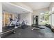 Well-equipped gym with modern exercise equipment, rubber flooring, and lots of natural light at 112 S Shore Dr, Belmont, NC 28012