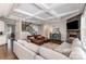 Spacious living room featuring a fireplace, coffered ceilings, and hardwood floors at 112 S Shore Dr, Belmont, NC 28012