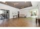 Spacious lobby with hardwood floors, neutral walls, ceiling fans, and views of the community outdoors at 112 S Shore Dr, Belmont, NC 28012