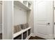 Mudroom features a bench with storage below and hooks above, ideal for organization at 112 S Shore Dr, Belmont, NC 28012