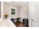 Office with built-in desk space, natural light, and a beverage refrigerator at 112 S Shore Dr, Belmont, NC 28012