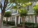 Two-story exterior with stone accents and manicured landscaping at 1139 Drummond Ln, Matthews, NC 28104