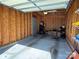 Spacious garage interior with shelving and ample storage space for vehicles and tools at 1139 Drummond Ln, Matthews, NC 28104