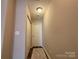 Neutral hallway with closet space and fresh paint; perfect for adding personal touches at 1139 Drummond Ln, Matthews, NC 28104