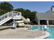 View of water slide next to community pool with chair lift for accessibility at 1139 Drummond Ln, Matthews, NC 28104