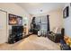 Bedroom with a gaming setup, sports decor, and a comfortable chair, creating a versatile space at 117 Marakery Rd # B, Mooresville, NC 28115