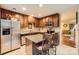 A stylish kitchen featuring stainless steel appliances, granite counters, and a breakfast bar with seating for two at 117 Marakery Rd # B, Mooresville, NC 28115
