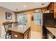 Kitchen with granite island, sliding glass doors, and modern appliances at 117 Marakery Rd # B, Mooresville, NC 28115