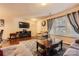 Bright living space with hardwood floors, large windows, and comfortable seating at 117 Marakery Rd # B, Mooresville, NC 28115