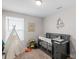 bedroom with a crib, teepee and plenty of room to play at 1177 Bannockburn Ave, Rock Hill, SC 29732