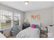 Cozy bedroom featuring plenty of light from the windows and a black dresser at 1177 Bannockburn Ave, Rock Hill, SC 29732