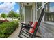 Relaxing front porch with rocking chair offering a comfortable outdoor space for unwinding at 1177 Bannockburn Ave, Rock Hill, SC 29732